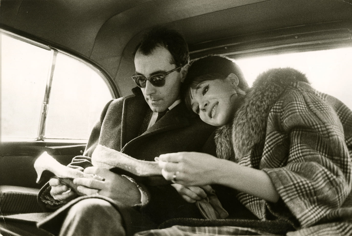 Jean-Luc Godard und Anna Karina_1, 1961 | Foto: Jean-Claude Sauer (1935–2012, FR) | OstLicht Vintage Photo Sale