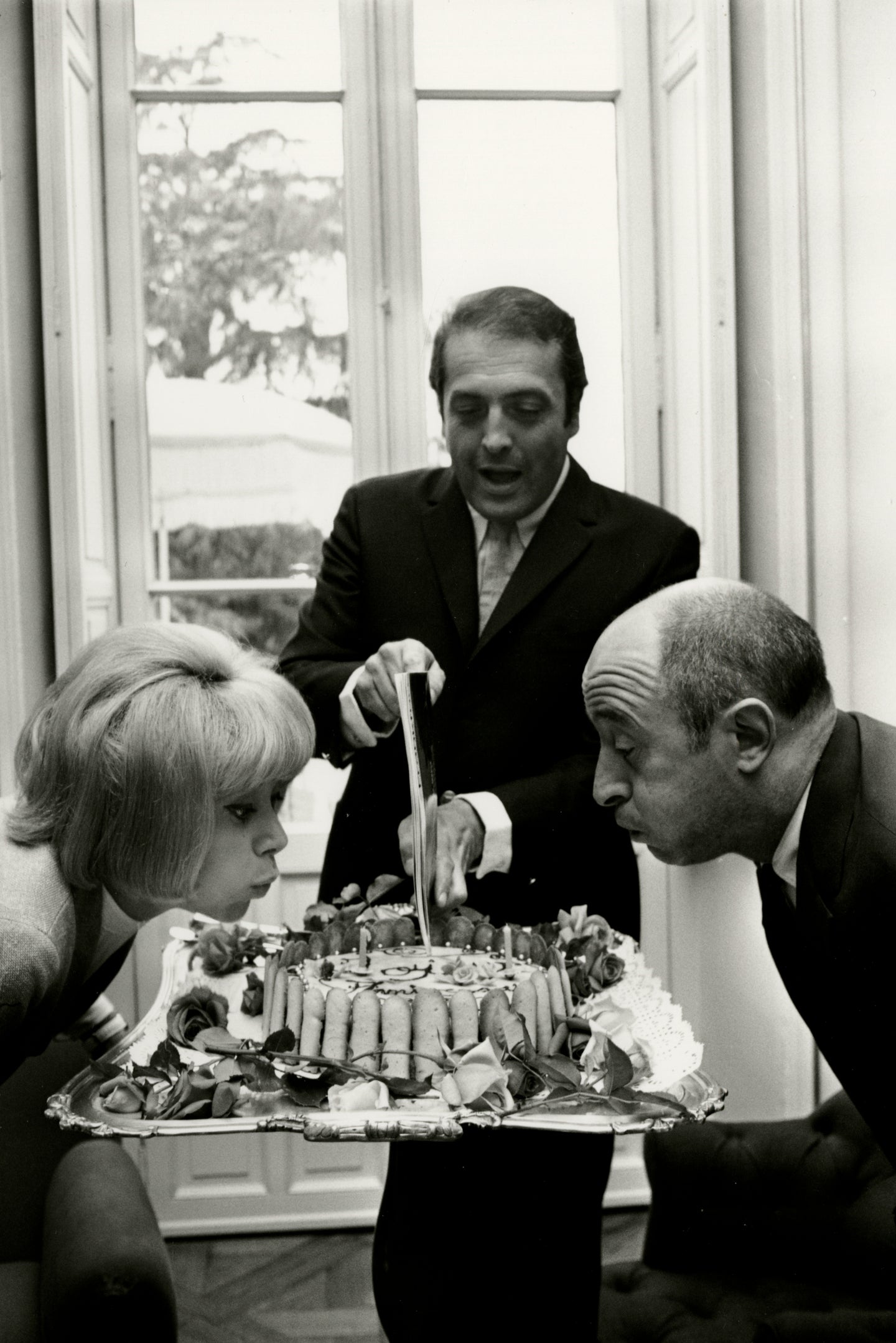 Mireille Darc, Michel Audiard & Georges Lautner, Geburtstagsfeier, Cannes Film Festival, 1966 | Foto: François Page | OstLicht Vintage Photo Sale